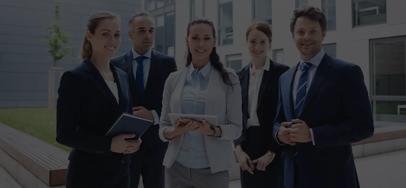 Professionals outside an office building