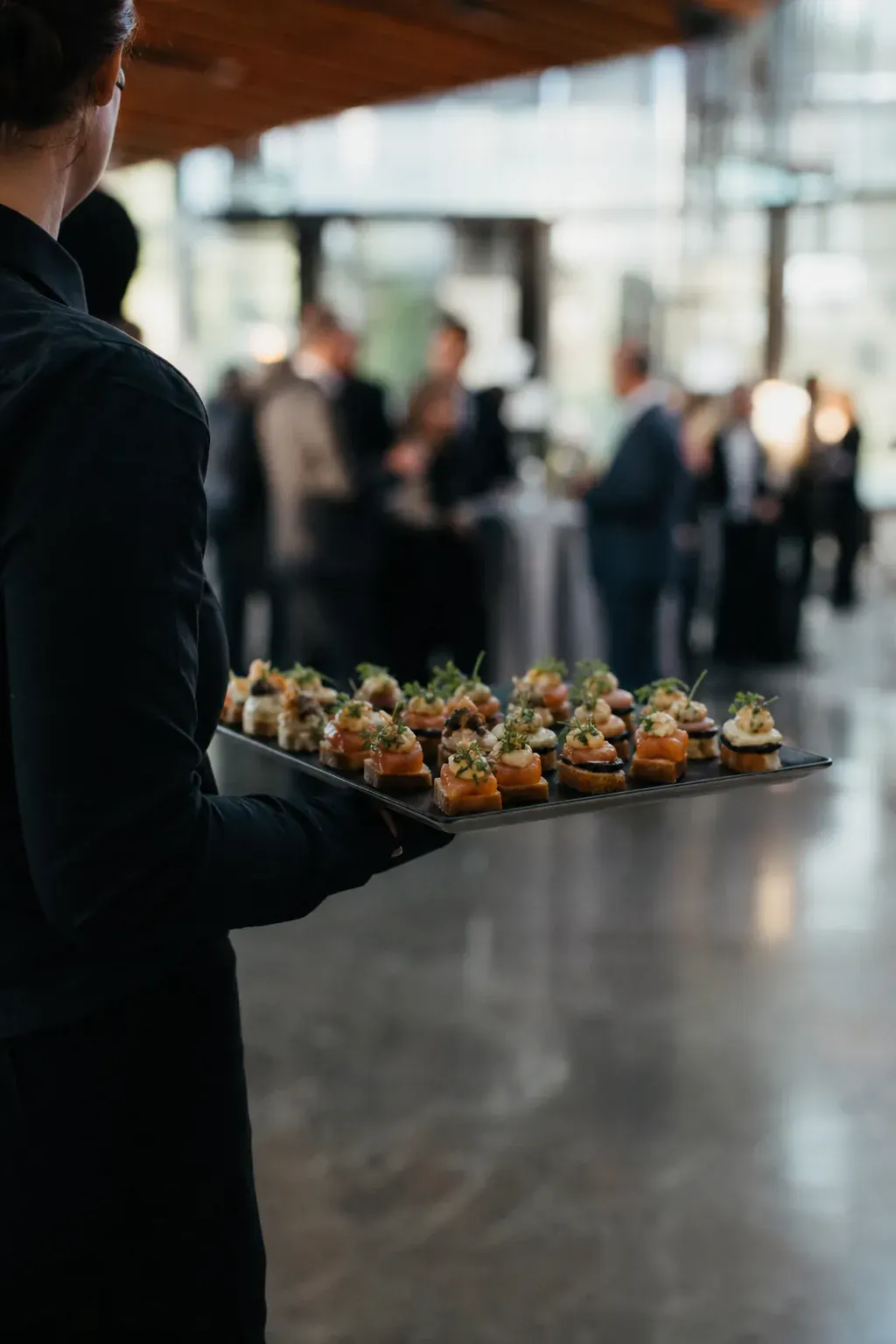 Catering server at a corporate event