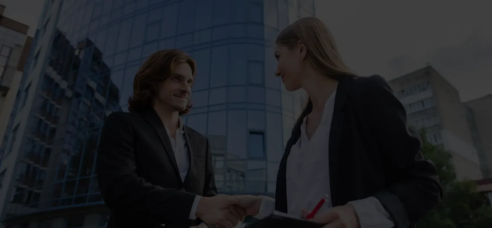 Business professionals reviewing plans