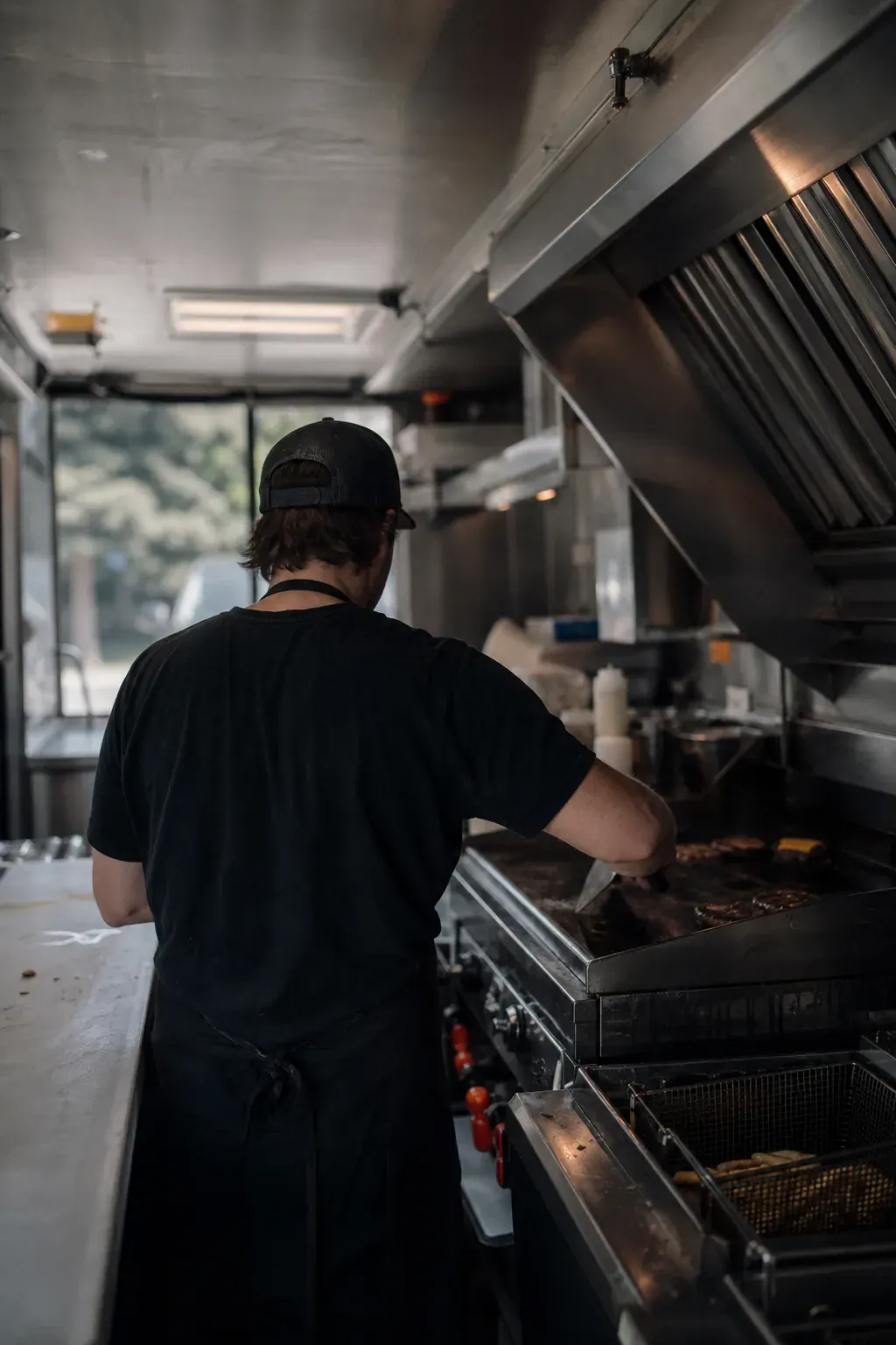 Cook inside a food truck