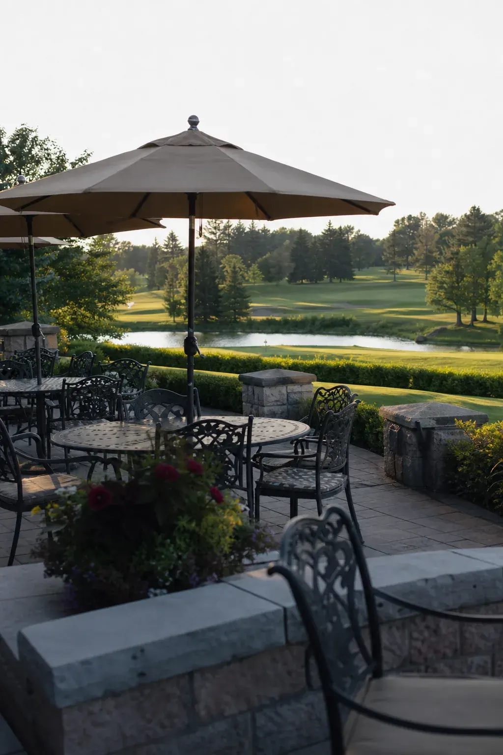 Golf clubhouse patio with tables overlooking the course in Ontario