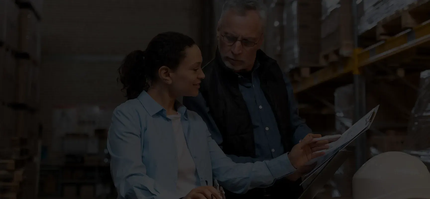 Warehouse team reviewing inventory